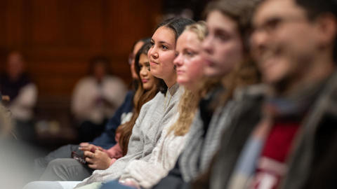 Students listen intently during a program.