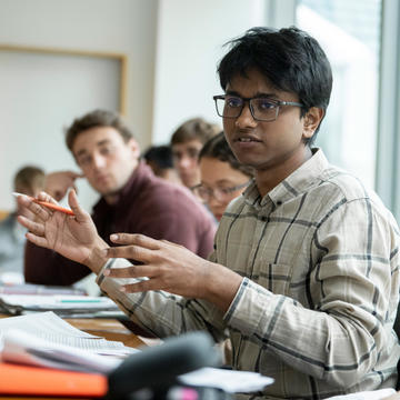 A student participates in an Expos 20 course