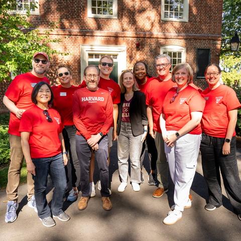 Group photo in front of Mass Hall with all the College leadership, and President Bacow and his wife.