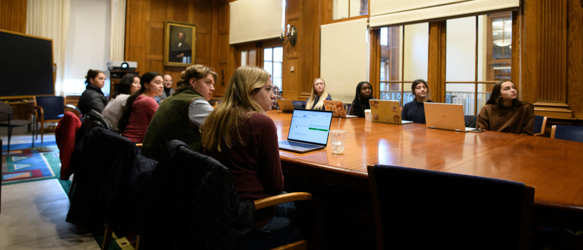 Students seated around a round table