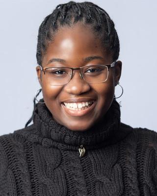 A headshot of Rebecca Asare.